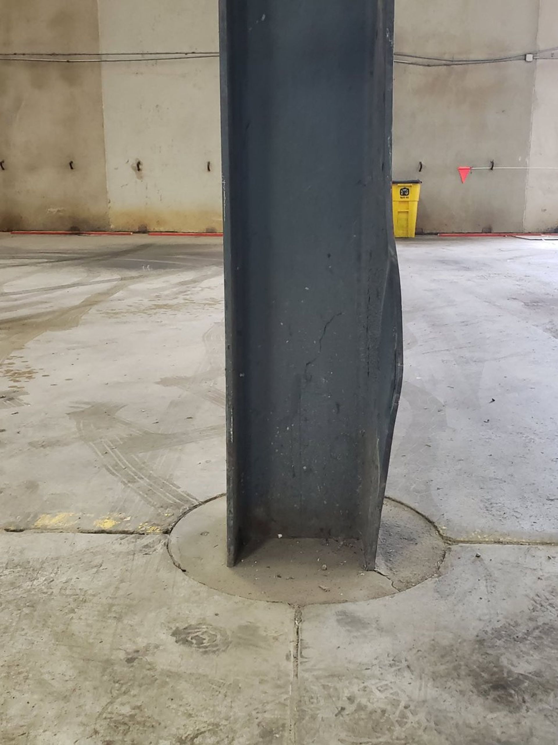 Impact-damaged steel column before heat straightening