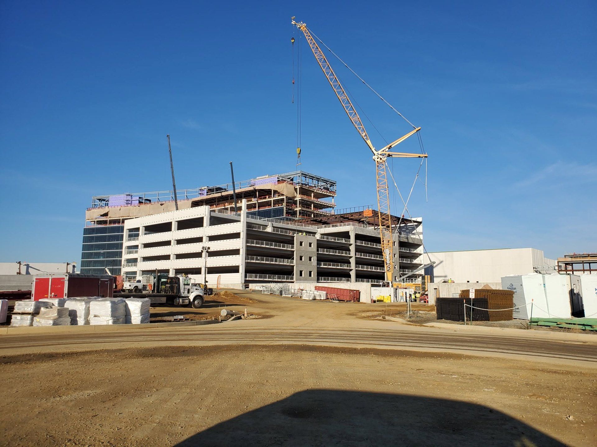Precast parking structure and building under erection
