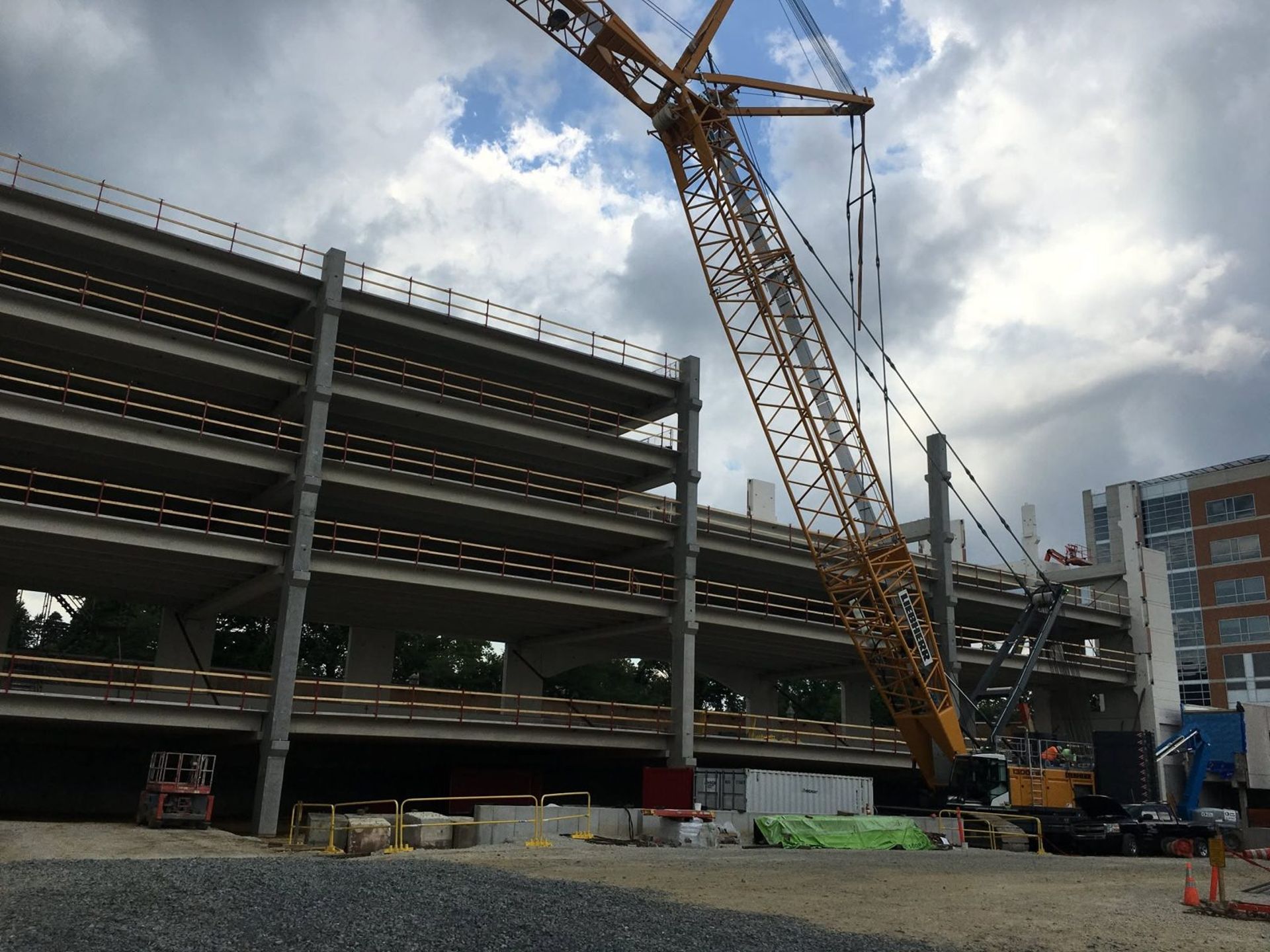 Crane erecting a precast parking garage