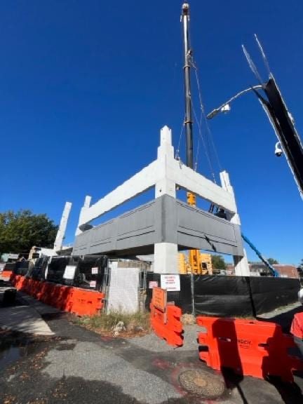 Crane setting precast framing on the Dover Mobility Hub parking structure