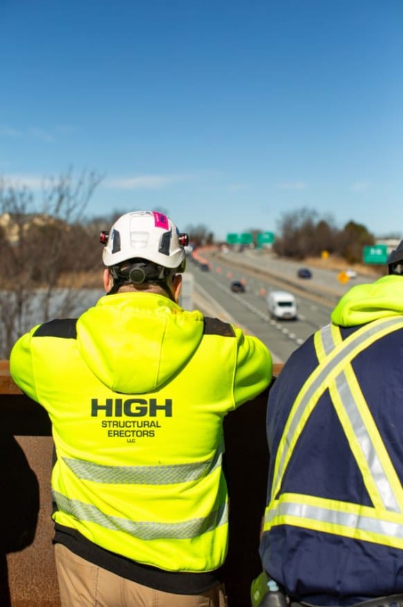 HSE crew members overlooking traffic on the corridor near the Goshen repair